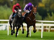 15 September 2018; Roaring Lion, left, with Oisin Murphy up, races clear of Saxon Warrior, with Ryan Moore up, on their way to winning the QIPCO Irish Champion Stakes during Irish Champions Stakes Day during the Leopardstown Races at Leopardstown in Dublin. Photo by Sam Barnes/Sportsfile