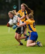 15 September 2018; Ciara McAnespie of Emyvale, Co Monaghan, in action against Anne Marie Meenaghan, centre, and Louise Henchy of Banner Ladies, Ennis, Co Clare, in the Senior Championship Final during the 2018 LGFA All-Ireland Club 7s at Naomh Mearnóg & St Sylvesters in Dublin. Photo by Piaras Ó Mídheach/Sportsfile