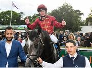15 September 2018; Jockey Oisin Murphy celebrates with winning connections following The QIPCO Irish Champion Stakes on Roaring Lion during Irish Champions Stakes Day during the Leopardstown Races at Leopardstown in Dublin. Photo by Sam Barnes/Sportsfile