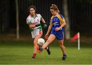 15 September 2018; Lisa Cafferkey of Parnells, London, in action against Siofra O'Dea of Kilmurry Ibrickane, Co Clare, in the Intermediate Championship Semi-Final during the 2018 LGFA All-Ireland Club 7s at Naomh Mearnóg & St Sylvesters in Dublin.    Photo by Piaras Ó Mídheach/Sportsfile