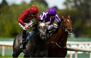 15 September 2018; Roaring Lion, left, with Oisin Murphy up, races clear of Saxon Warrior, with Ryan Moore up, on their way to winning the QIPCO Irish Champion Stakes during Irish Champions Stakes Day during the Leopardstown Races at Leopardstown in Dublin.  Photo by Sam Barnes/Sportsfile