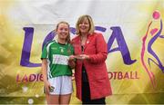 15 September 2018; Marie Hickey, President, LGFA, makes a presentation to Katie Carter of Moycullen of Galway, Senior Shield Runners-Up, during the 2018 LGFA All-Ireland Club 7s at Naomh Mearnóg & St Sylvesters in Dublin.    Photo by Piaras Ó Mídheach/Sportsfile