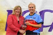 15 September 2018; Marie Hickey, President, LGFA, makes a presentation to Katelyn Maloney of Tuam Cortoon of Galway, runners-up in the Intermediate Championship Final to Parnells, London, during the 2018 LGFA All-Ireland Club 7s at Naomh Mearnóg & St Sylvesters in Dublin. Photo by Piaras Ó Mídheach/Sportsfile