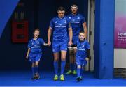 15 September 2018; Mascots Nina Merry and James O'Reilly with Leinster captain Jonathan Sexton prior to the Guinness PRO14 Round 3 match between Leinster and Dragons at the RDS Arena in Dublin. Photo by Brendan Moran/Sportsfile