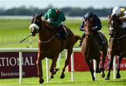 16 September 2018; Eziyra, with Declan McDonogh up, on their way to winning the The Moyglare `Jewels` Blandford Stakes from third place I'm So Fancy, with Shane Foley up, and fourth place Curly, with Seamie Heffernan up, centre, during the Curragh Races on St Ledger Day at the Curragh Racecourse in Curragh, Kildare. Photo by Matt Browne/Sportsfile