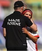 16 September 2018; Lycrecia Quinn of Tyrone is embraced by selector Barry Grimes after being substituted during the TG4 All-Ireland Ladies Football Intermediate Championship Final match between Meath and Tyrone at Croke Park, Dublin. Photo by David Fitzgerald/Sportsfile