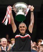 16 September 2018; Tyrone manager Gerry Moane lifts the Mary Quinn Memorial cup following the TG4 All-Ireland Ladies Football Intermediate Championship Final match between Meath and Tyrone at Croke Park, Dublin. Photo by David Fitzgerald/Sportsfile