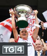 16 September 2018; Tyrone captain Neamh Woods lifts the Mary Quinn Memorial cup following the TG4 All-Ireland Ladies Football Intermediate Championship Final match between Meath and Tyrone at Croke Park, Dublin. Photo by David Fitzgerald/Sportsfile