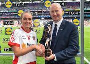 16 September 2018; Neamh Woods of Tyrone is presented with the player of the match award by Ceannaire Spóirt TG4 Rónán Ó Coisdealbha after the TG4 All-Ireland Ladies Football Intermediate Championship Final match between Meath and Tyrone at Croke Park, Dublin. Photo by Eóin Noonan/Sportsfile