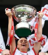 16 September 2018; Tyrone captain Neamh Woods lifts the Mary Quinn Memorial cup following the TG4 All-Ireland Ladies Football Intermediate Championship Final match between Meath and Tyrone at Croke Park, Dublin. Photo by David Fitzgerald/Sportsfile