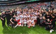 16 September 2018; The Tyrone team celebrate with the Mary Quinn Memorial cup following the TG4 All-Ireland Ladies Football Intermediate Championship Final match between Meath and Tyrone at Croke Park, Dublin. Photo by David Fitzgerald/Sportsfile