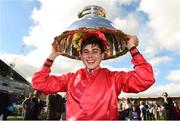 16 September 2018; Jockey Ronan Whelan celebrates with the Moyglare Stud Stakes trophy after winning The Moyglare Stud Stakes on Skitter Scatter at the Curragh Races on St Ledger Day at the Curragh Racecourse in Curragh, Kildare. Photo by Matt Browne/Sportsfile