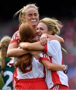 16 September 2018; Tyrone players, from left, Niamh Mc Girr, Neamh Woods  and Emma Mulgrew celebrate at the final whistle of the TG4 All-Ireland Ladies Football Intermediate Championship Final match between Meath and Tyrone at Croke Park, Dublin. Photo by Brendan Moran/Sportsfile
