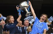 16 September 2018; Sinéad Finnegan of Dublin, right, lifts the cup with her sister Claire Finnegan, Dublin Stats Analyst following the TG4 All-Ireland Ladies Football Senior Championship Final match between Cork and Dublin at Croke Park, Dublin. Photo by David Fitzgerald/Sportsfile