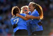 16 September 2018; Dublin players, from left, Niamh Collins, Sinéad Finnegan and Amy Connolly celebrate at the final whistle of the TG4 All-Ireland Ladies Football Senior Championship Final match between Cork and Dublin at Croke Park, Dublin. Photo by Brendan Moran/Sportsfile