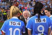 16 September 2018; President Michael D. Higgins meets Carla Rowe, left, and Olwen Carey of Dublin prior to the TG4 All-Ireland Ladies Football Senior Championship Final match between Cork and Dublin at Croke Park, Dublin. Photo by David Fitzgerald/Sportsfile