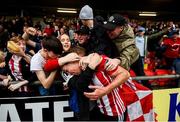 16 September 2018; Ben Fisk celebrates with the Derry City supporters after their second goal during the EA SPORTS Cup Final between Derry City and Cobh Ramblers at the Brandywell Stadium in Derry. Photo by Stephen McCarthy/Sportsfile
