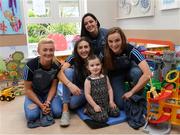 17 September 2018; Anna May Shields, age 3, from Portlaoise in Laois, from Dublin footballers, from left, Carla Rowe, Lucy Collins, Sinéad Goldrick and Deidre Murphy during the TG4 All-Ireland Senior Ladies Football Champions visit to Our Lady’s Children’s Hospital Crumlin, in Dublin. Photo by Piaras Ó Mídheach/Sportsfile