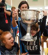 17 September 2018; Zach Ring, age 8, from Swords in Dublin, with Dublin footballers Lauren Magee and Lyndsey Davey, top, with the Brendan Martin Cup during the TG4 All-Ireland Senior Ladies Football Champions visit to Our Lady’s Children’s Hospital Crumlin, in Dublin. Photo by Piaras Ó Mídheach/Sportsfile