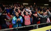 16 September 2018; Derry City supporters celebrate during the EA SPORTS Cup Final between Derry City and Cobh Ramblers at the Brandywell Stadium in Derry. Photo by Stephen McCarthy/Sportsfile