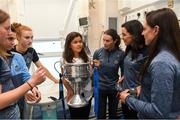 17 September 2018; Maya Kulendran, from Castlebar, Co Mayo, with the Brendan Martin Cup and members of the Dublin team during the TG4 All-Ireland Senior Ladies Football Champions visit Temple Street Children's University Hospital in Dublin. Photo by Piaras Ó Mídheach/Sportsfile