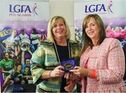 16 September 2018; 1993 Jubilee Team are honoured ahead of the TG4 All-Ireland Ladies Football Senior Championship Final match between Cork and Dublin. Pictured, LFGA CEO Helen O'Rourke, right, makes a presentation to LGFA President Marie Hickey at Croke Park in Dublin. Photo by Sam Barnes/Sportsfile