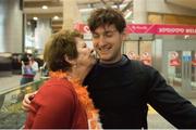 17 September 2018; Paul O'Donovan of Team Ireland with his grandmother Mary Doab on his return from the World Rowing Championships in Bulgaria at Cork Airport in Cork. Photo by Eóin Noonan/Sportsfile