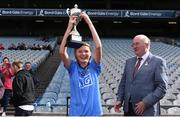 18 September 2018; Dublin Girl's Captain Kate O’Brien, from St Michaels School, Chapelizod, celebrates after being presented with the cup by Uachtarán Chumann Lúthchleas Gael John Horan during the M.Donnelly GAA Football for ALL Interprovincial Finals at Croke Park in Dublin. Photo by Sam Barnes/Sportsfile