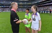 16 September 2018; Referee Garryowen McMahon is presented with the match ball by Temi Falegan and Réiltín Candan, both from St Laurence O’Toole NS, Seville Place, Dublin, prior to the TG4 All-Ireland Ladies Football Senior Championship Final match between Cork and Dublin at Croke Park, Dublin. Photo by Brendan Moran/Sportsfile