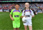 16 September 2018; Match ball presenters Temi Falegan and Réiltín Candan, both from St Laurence O’Toole NS, Seville Place, Dublin, prior to the TG4 All-Ireland Ladies Football Senior Championship Final match between Cork and Dublin at Croke Park, Dublin. Photo by Brendan Moran/Sportsfile