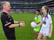 16 September 2018; Referee Garryowen McMahon is presented with the match ball by Temi Falegan and Réiltín Candan, both from St Laurence O’Toole NS, Seville Place, Dublin, prior to the TG4 All-Ireland Ladies Football Senior Championship Final match between Cork and Dublin at Croke Park, Dublin. Photo by Brendan Moran/Sportsfile