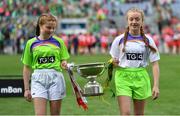 16 September 2018; Katie, left, and Meaghan Greene, St Mary’s GAA club, Meath, carry the Mary Quinn Memorial Cup onto the pitch prior to the TG4 All-Ireland Ladies Football Intermediate Championship Final match between Meath and Tyrone at Croke Park, Dublin. Photo by Brendan Moran/Sportsfile