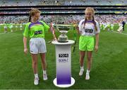 16 September 2018; Katie, left, and Meaghan Greene, St Mary’s GAA club, Meath, carry the Mary Quinn Memorial Cup onto the pitch prior to the TG4 All-Ireland Ladies Football Intermediate Championship Final match between Meath and Tyrone at Croke Park, Dublin. Photo by Brendan Moran/Sportsfile