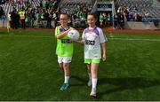 16 September 2018; Match ball carriers Mya McAuley, and Alex Norman, both from St Joseph’s NS, East Wall, Dublin, prior to the TG4 All-Ireland Ladies Football Intermediate Championship Final match between Meath and Tyrone at Croke Park, Dublin. Photo by Brendan Moran/Sportsfile