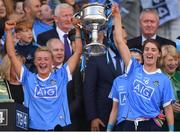 16 September 2018; Dublin players Carla Rowe, left, and Oonagh Whyte celebrate with the Brendan Martin cup after the TG4 All-Ireland Ladies Football Senior Championship Final match between Cork and Dublin at Croke Park, Dublin. Photo by Brendan Moran/Sportsfile