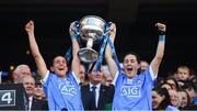 16 September 2018; Siobhán McGrath, left, and Lyndsey Davey of Dublin lift the Brendan Martin cup following the TG4 All-Ireland Ladies Football Senior Championship Final match between Cork and Dublin at Croke Park, Dublin. Photo by David Fitzgerald/Sportsfile