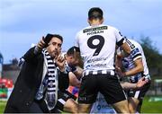 21 September 2018; A Dundalk supporter celebrates with players after Chris Shields scored their opening goal during the SSE Airtricity League Premier Division match between Cork City and Dundalk at Turners Cross in Cork. Photo by Stephen McCarthy/Sportsfile