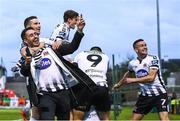 21 September 2018; Patrick McEleney celebrates with a Dundalk supporter and team-mates after Chris Shields scored their opening goal during the SSE Airtricity League Premier Division match between Cork City and Dundalk at Turners Cross in Cork. Photo by Stephen McCarthy/Sportsfile