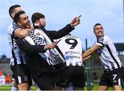 21 September 2018; Patrick McEleney celebrates with a Dundalk supporter and team-mates after Chris Shields scored their opening goal during the SSE Airtricity League Premier Division match between Cork City and Dundalk at Turners Cross in Cork. Photo by Stephen McCarthy/Sportsfile