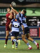 21 September 2018; Joey Carbery of Munster competes for a high ball with Jason Harris and Matthew Morgan of Cardiff Blues during the Guinness PRO14 Round 4 match between Cardiff Blues and Munster at Cardiff Arms Park in Cardiff, Wales. Photo by Chris Fairweather/Sportsfile