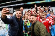 22 September 2018; The 2 Johnnies take a selfie with young players during the Littlewoods Ireland Connacht Provincial Days Go Games in Croke Park. This year over 6,000 boys and girls aged between six and eleven represented their clubs in a series of mini blitzes and – just like their heroes – got to play in Croke Park. For exclusive content and behind the scenes action follow Littlewoods Ireland on Facebook, Instagram, Twitter and https://blog.littlewoodsireland.ie/ Photo by Eóin Noonan/Sportsfile