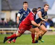 22 September 2018; Kieran Marmion of Connacht is tackled by Ken Owens of Scarlets during the Guinness PRO14 Round 4 match between Connacht and Scarlets at the Sportsground in Galway. Photo by Seb Daly/Sportsfile