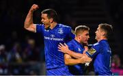 22 September 2018; Jordan Larmour of Leinster celebrates with team-mates Jonathan Sexton, left, and Luke McGrath, after scoring his side's third try during the Guinness PRO14 Round 4 match between Leinster and Edinburgh at the RDS Arena in Dublin. Photo by Ramsey Cardy/Sportsfile