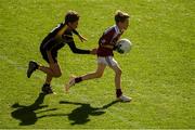 23 September 2018; Darragh McKeown of Shamrock Gaels, Co Sligo, in action against Michael Coyne of Ballinasloe, Co Galway, during the Littlewoods Ireland Connacht Provincial Days Go Games in Croke Park. This year over 6,000 boys and girls aged between six and eleven represented their clubs in a series of mini blitzes and – just like their heroes – got to play in Croke Park. For exclusive content and behind the scenes action follow Littlewoods Ireland on Facebook, Instagram, Twitter and https://blog.littlewoodsireland.ie/ Photo by Piaras Ó Mídheach/Sportsfile