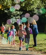 23 September 2018; Junior parkrun participants pictured at the St Anne’s junior parkrun where Vhi hosted a special event to celebrate their partnership with parkrun Ireland. Vhi hosted a lively warm up routine which was great fun for children and adults alike. Crossing the finish line was a special experience as children were showered with bubbles and streamers to celebrate their achievement and each child received a gift. Junior parkrun in partnership with Vhi support local communities in organising free, weekly, timed 2km runs every Sunday at 9.30am. To register for a parkrun near you visit www.parkrun.ie. Photo by Harry Murphy/Sportsfile