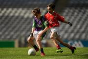 23 September 2018; Seán McKeown of Leitrim Gaels, Co Leitrim, left, in action against Ewan Loftus of Ballintubber, Co Mayo, during the Littlewoods Ireland Connacht Provincial Days Go Games in Croke Park. This year over 6,000 boys and girls aged between six and eleven represented their clubs in a series of mini blitzes and – just like their heroes – got to play in Croke Park. For exclusive content and behind the scenes action follow Littlewoods Ireland on Facebook, Instagram, Twitter and https://blog.littlewoodsireland.ie/ Photo by Piaras Ó Mídheach/Sportsfile