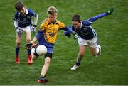 23 September 2018; Billy Ruane of Knockmore, Co Mayo, in action against Conor Loftus, left, and Gavin Mullaney of Breaffy, Co Mayo, at the Littlewoods Ireland Connacht Provincial Days Go Games in Croke Park. This year over 6,000 boys and girls aged between six and eleven represented their clubs in a series of mini blitzes and – just like their heroes – got to play in Croke Park. For exclusive content and behind the scenes action follow Littlewoods Ireland on Facebook, Instagram, Twitter and https://blog.littlewoodsireland.ie/ Photo by Piaras Ó Mídheach/Sportsfile