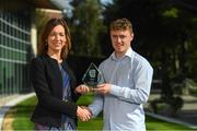 24 September 2018; Kildare footballer Jimmy Hyland is presented with his EirGrid U20 GAA Football All-Ireland Championship Player of The Year award by Valerie Hedin, External Communications Manager at EirGrid, at The Oval, Shelbourne Road, Ballsbridge, in Dublin. Photo by Piaras Ó Mídheach/Sportsfile