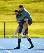 24 September 2018; Ciaran Parker gets a lift from team-mate Kevin O'Byrne as they arrive for Munster Rugby squad training at the University of Limerick in Limerick. Photo by Diarmuid Greene/Sportsfile