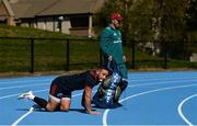 24 September 2018; Alby Mathewson and defence coach JP Ferreira make their way across the athletics track as they arrive for Munster Rugby squad training at the University of Limerick in Limerick. Photo by Diarmuid Greene/Sportsfile